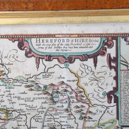 517 - A 17th Century hand coloured map of Herefordshire by John speede, 52 x42cm, framed