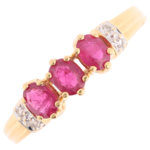 1225 - An 18ct gold ruby and diamond dress ring, claw set with oval mixed-cut rubies and single-cut diamond... 