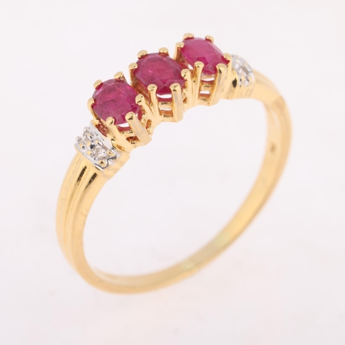 1225 - An 18ct gold ruby and diamond dress ring, claw set with oval mixed-cut rubies and single-cut diamond... 