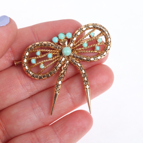 1281 - ** WITHDRAWN** A 14ct gold turquoise ribbon bow brooch, maker HE, popcorn link decoration with openw... 