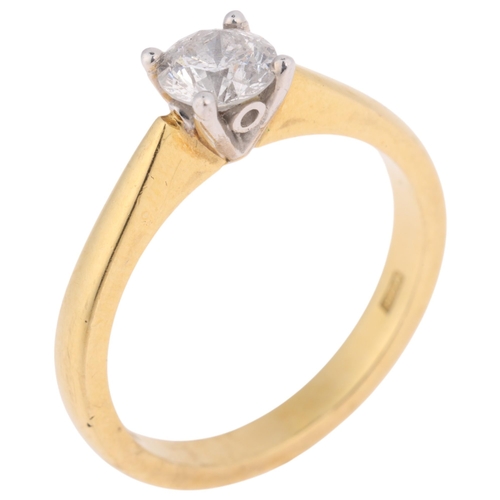 1305 - An 18ct gold 0.6ct single stone diamond ring, maker MDR, London 2003, claw set with modern round bri... 