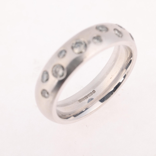 1309 - An 18ct white gold diamond band ring, maker CPM, set with modern round brilliant-cut diamonds, total... 