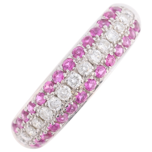 1320 - An 18ct white gold pink sapphire and diamond band ring, maker PJW, London 2002, set with central row... 