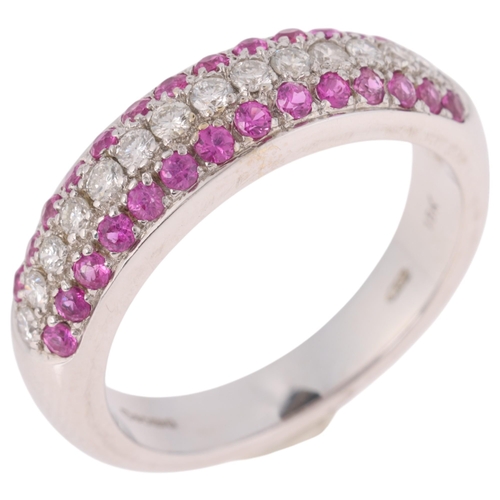 1320 - An 18ct white gold pink sapphire and diamond band ring, maker PJW, London 2002, set with central row... 