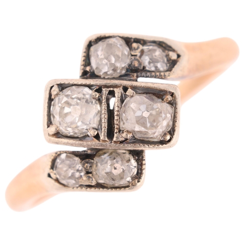 1334 - An Antique 9ct gold diamond crossover ring, circa 1910, set with old-cut diamonds, total diamond con... 