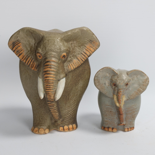 180 - BERNARD ROOKE, British, 2 1970's stoneware elephants, 1 with maker's label, tallest 20cm