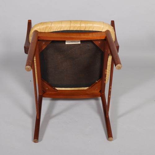 183 - A 1960s/70s teak armchair with faux beige leather upholstery, no maker's marks, height 87cm