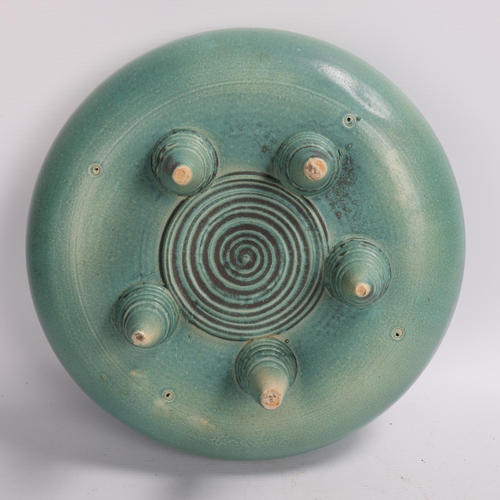 192 - A studio ceramic stoneware pillow bowl on 5 turned legs, blue/green soda glaze,  no makers marks, di... 