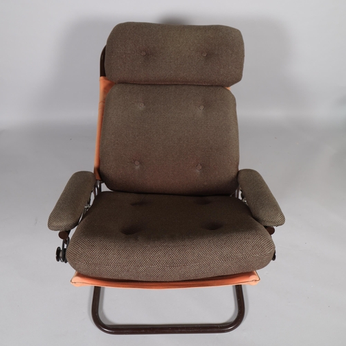 225 - A mid 20th century Scandinavian style reclining chair, with tubular steel pivot frame and original b... 