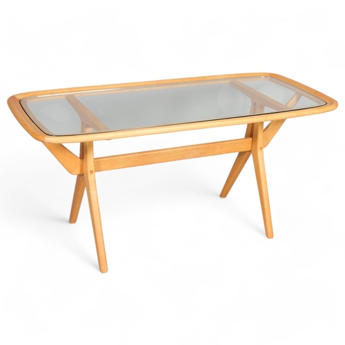 233 - De Ster Gelderland, a mid-century blonde sycamore coffee table with inset glass top, height 50cm, to... 