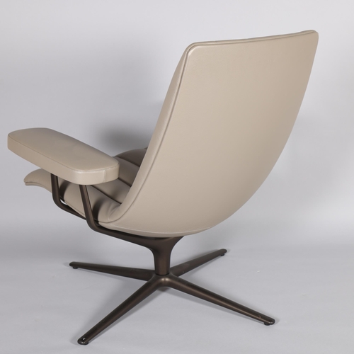 27 - WALTER KNOLL, GERMANY, a Healey leather swivel lounge chair on mat bronze base, designed by Pearson ... 