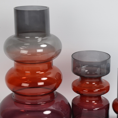 33 - 3 mid-20th century matching graduated coloured glass vases, tallest 30cm