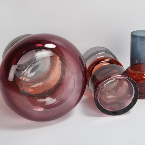 33 - 3 mid-20th century matching graduated coloured glass vases, tallest 30cm