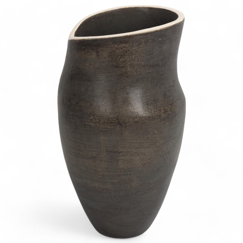 69 - DEANA MOORE, British, hand-coiled vessel with burnished black exterior and white rim, impressed make... 