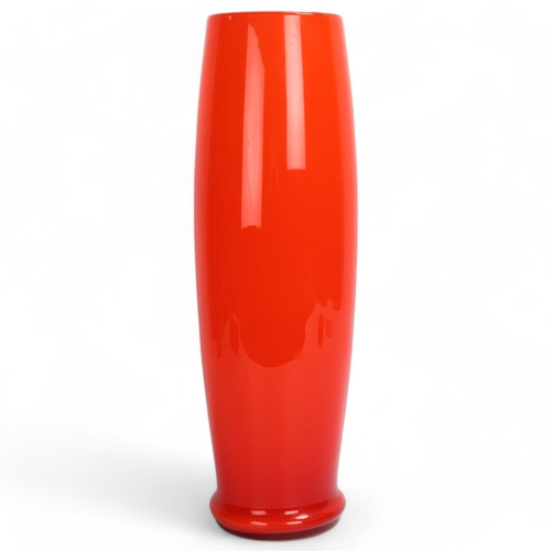 75 - A mid-20th century red barrel glass vase, no maker's marks, height 42cm