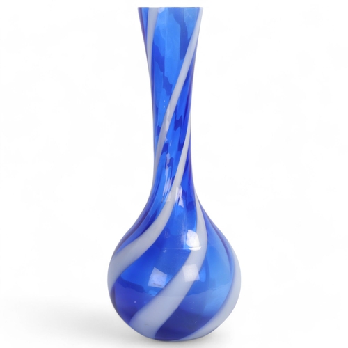 76 - A mid-20th century large blue and white swirl glass vase, partial label to base, height 50cm