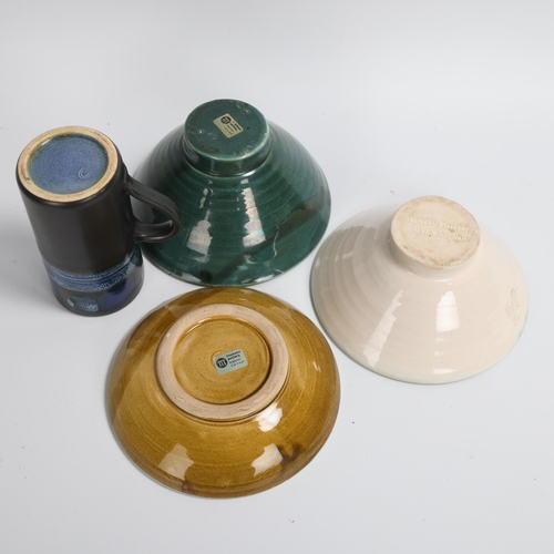 86 - 4 pieces of Tremaen Pottery, Newlyn, Cornwall, dishes with maker's label or stamp, diameter 14.5cm