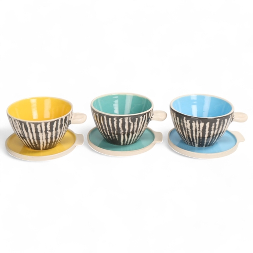 90 - ERIC LEAPER, Newlyn, Cornwall, a set of 3 studio ceramic tea bowls and saucers with pinched handles,... 