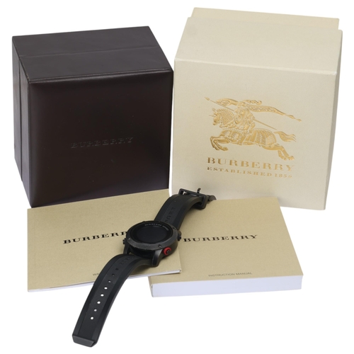 1002 - BURBERRY - a black Ionized stainless steel Sport digital quartz wristwatch, ref. BU7704, digital dia... 