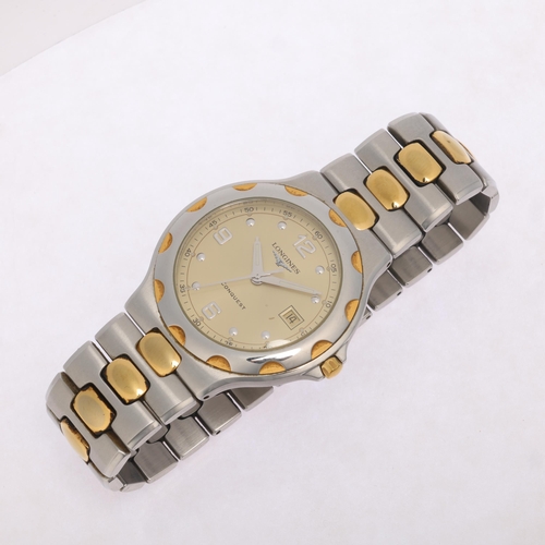 1003 - LONGINES - a gold plated stainless steel Conquest quartz calendar bracelet watch, ref. L1.633.3, cha... 