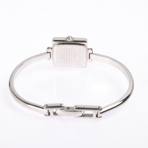 1015 - GUCCI - a lady's stainless steel 1900L quartz bangle watch, circa 2000, square silvered dial with le... 