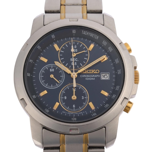 1041 - SEIKO - a stainless steel quartz chronograph bracelet watch, ref. 7T92-0BF0, blue dial with applied ... 