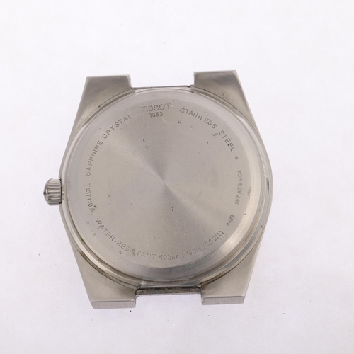 1043 - TISSOT - a stainless steel PRX quartz bracelet watch head, ref. T137.410, blue dial with baton hour ... 