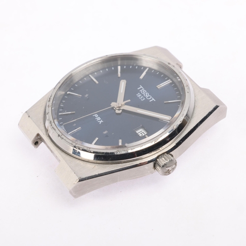 1043 - TISSOT - a stainless steel PRX quartz bracelet watch head, ref. T137.410, blue dial with baton hour ... 