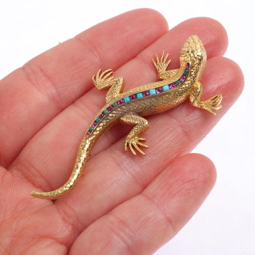 1101 - CARTIER - an 18ct gold ruby and turquoise lizard brooch, circa 1940, realistically modelled as a liz... 