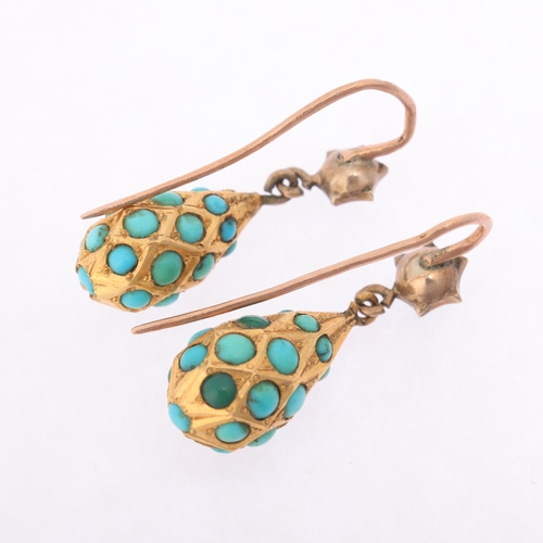 1107 - A pair of Antique Victorian 15ct turquoise torpedo drop earrings, circa 1860, the drops of faceted f... 