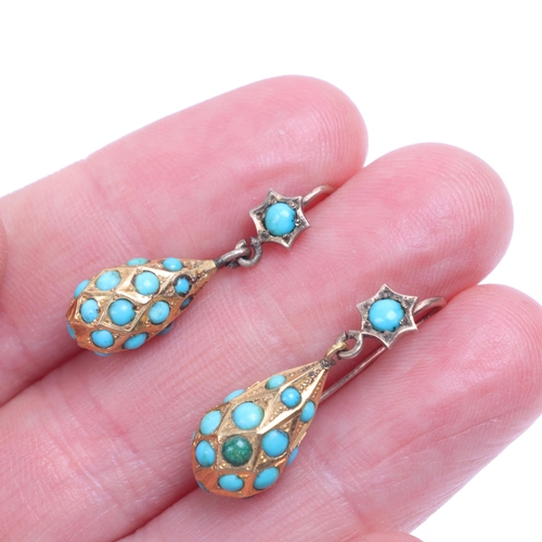 1107 - A pair of Antique Victorian 15ct turquoise torpedo drop earrings, circa 1860, the drops of faceted f... 