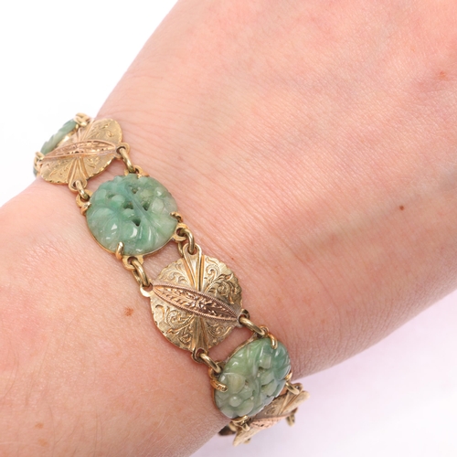 1112 - An 18ct two-colour gold jade panel bracelet, with alternating floral carved and pierced jade, and fo... 