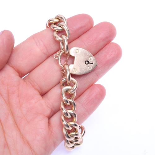 1114 - An Antique 9ct rose gold hollow curb link chain bracelet, maker WHW Ltd, with 9ct heart padlock clas... 