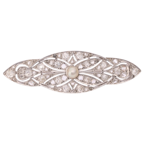 1121 - An Art Deco pearl and diamond plaque brooch, circa 1930, of shaped marquise openwork form, centrally... 