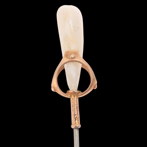 1123 - MURRLE BENNETT & CO - an Arts and Crafts 9ct gold Baroque pearl stickpin, early 20th century, the op... 