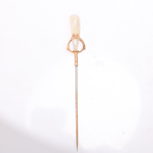 1123 - MURRLE BENNETT & CO - an Arts and Crafts 9ct gold Baroque pearl stickpin, early 20th century, the op... 