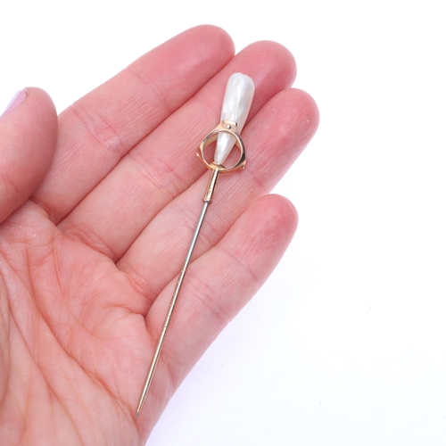 1123 - MURRLE BENNETT & CO - an Arts and Crafts 9ct gold Baroque pearl stickpin, early 20th century, the op... 