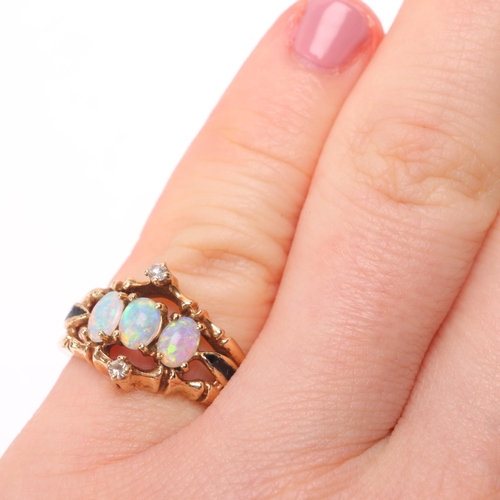 1139 - A 14ct gold opal and diamond openwork ring, maker JTG, claw set with oval cabochon opals, within fau... 