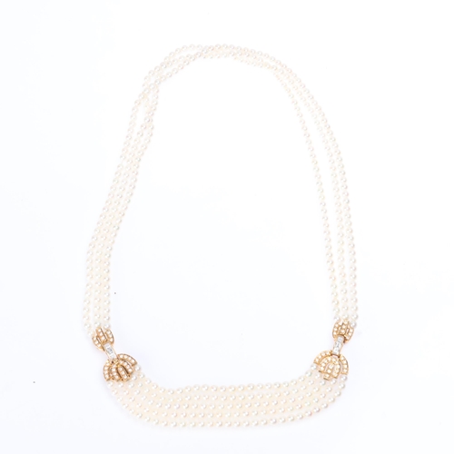 1140 - BOUCHERON - an 18ct gold multi-strand pearl and diamond necklace, the graduated pearls ranging from ... 