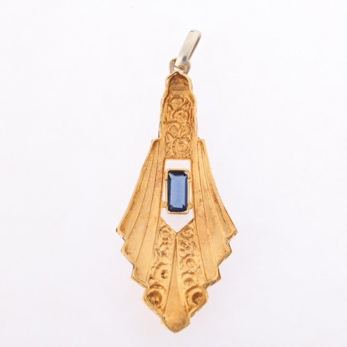 1141 - An Art Deco French 18ct two-colour gold sapphire pendant, geometric form with relief embossed floral... 