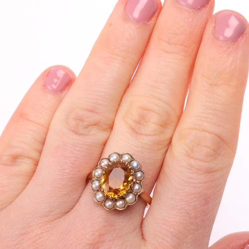 1150 - An Antique 9ct gold citrine split pearl cluster ring, the flowerhead set with oval mixed-cut citrine... 