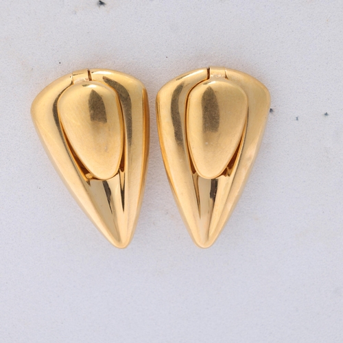 1152 - A pair of Italian modernist 9ct gold drop stud earrings, by Unoaerre, openwork Delta wing form, with... 