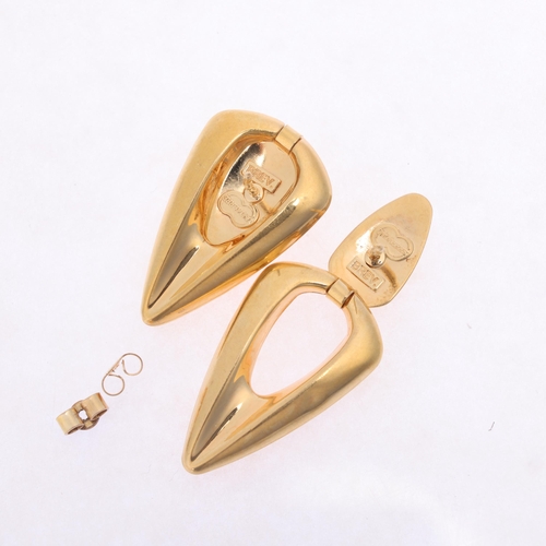 1152 - A pair of Italian modernist 9ct gold drop stud earrings, by Unoaerre, openwork Delta wing form, with... 