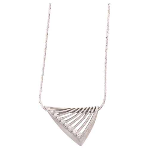 1161 - A platinum diamond openwork fold pendant necklace, by The Platinum Store, import hallmarks London 19... 