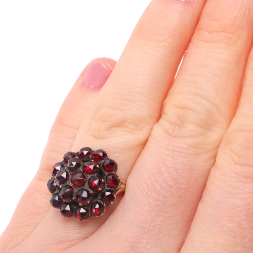 1168 - An Antique Victorian Bohemian garnet cluster ring, set with rose-cut garnets with closed-back settin... 