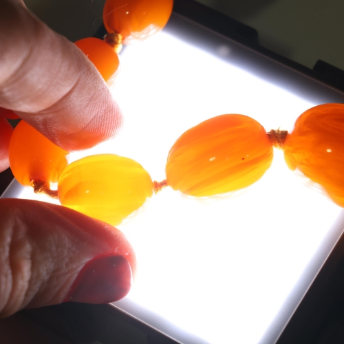 1171 - A Vintage single-strand graduated butterscotch amber bead necklace, beads ranging from: 22.4mm - 9.3... 