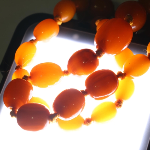 1171 - A Vintage single-strand graduated butterscotch amber bead necklace, beads ranging from: 22.4mm - 9.3... 