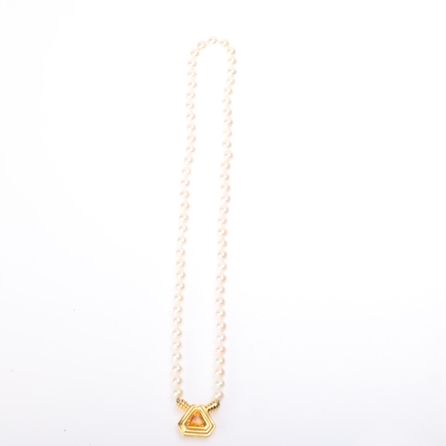 1176 - A single-strand pearl bead necklace, set with 6.2mm pearls, with 18ct gold citrine triangle clasp, t... 