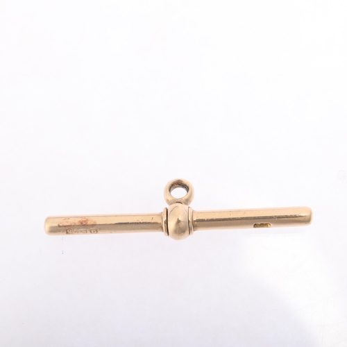 1179 - An Antique 9ct gold T-bar, maker JM, 38mm, 3.2g