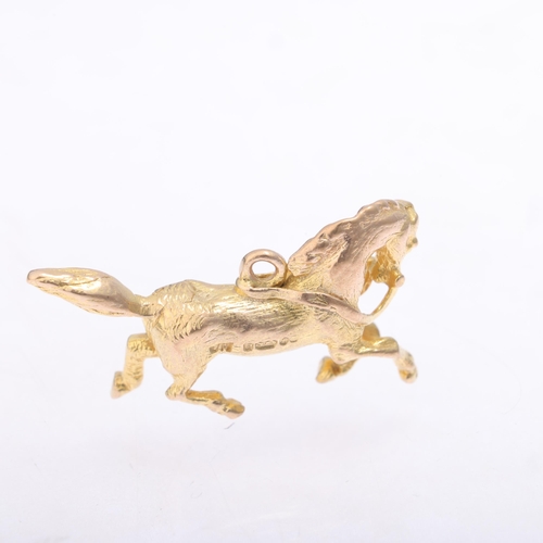 1187 - A 9ct gold horse charm/pendant, maker JH, London 1961, 26.7mm, 4.8g